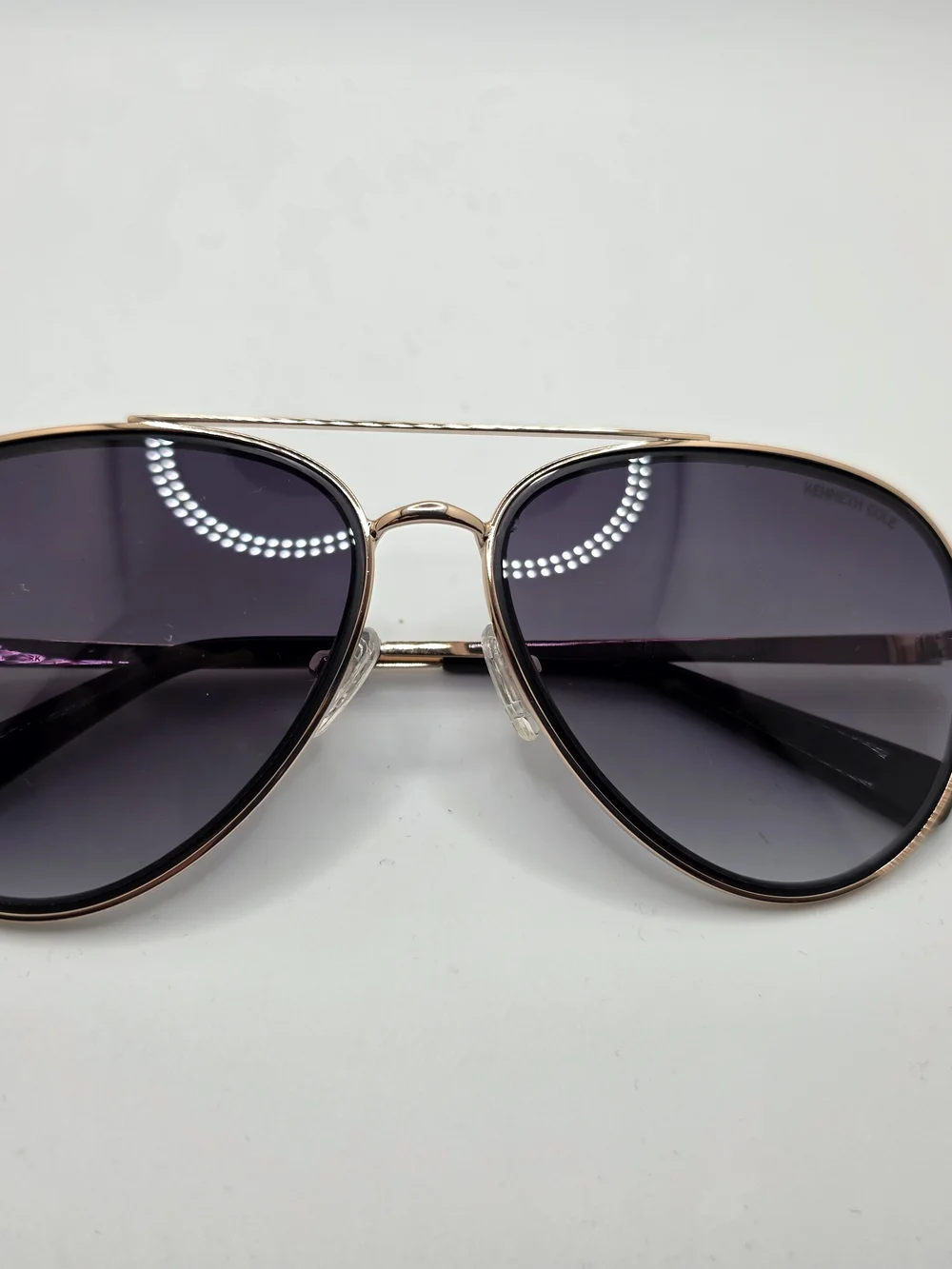 Kenneth Cole Rose Gold Aviator Sunglasses with Dark Gradient Lenses